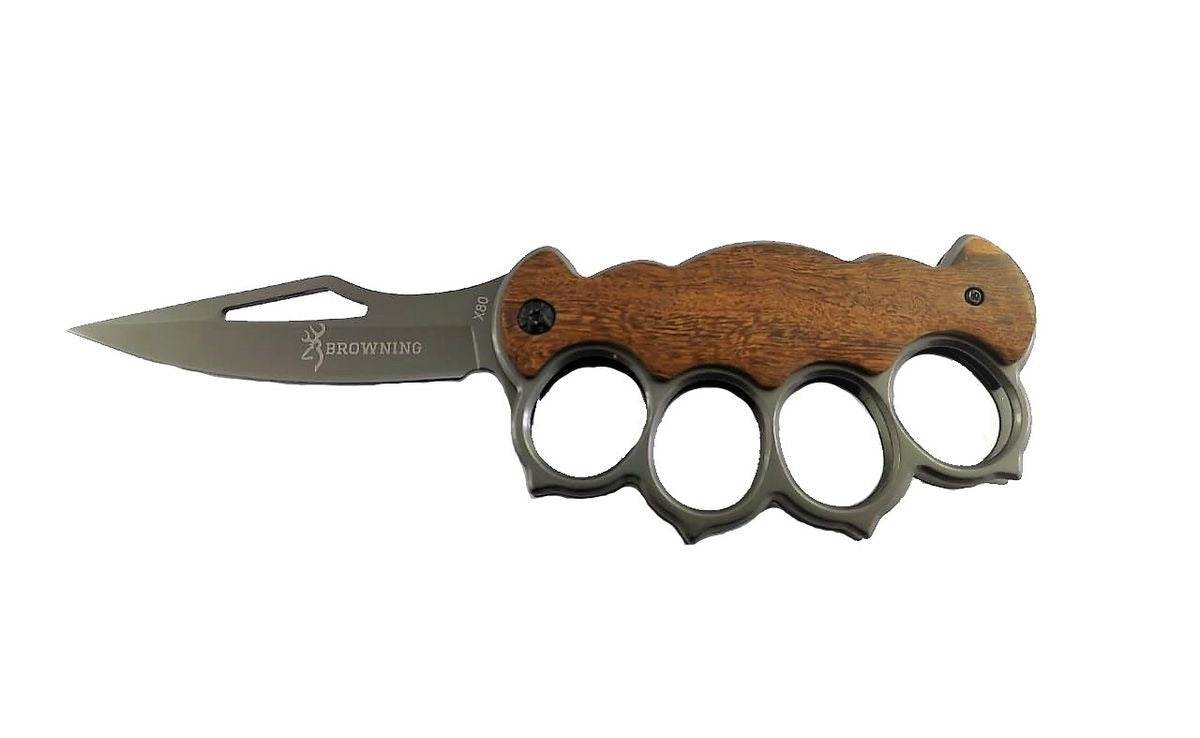 folding pocket knife and knuckle duster folding pocket knife and knuckle duster